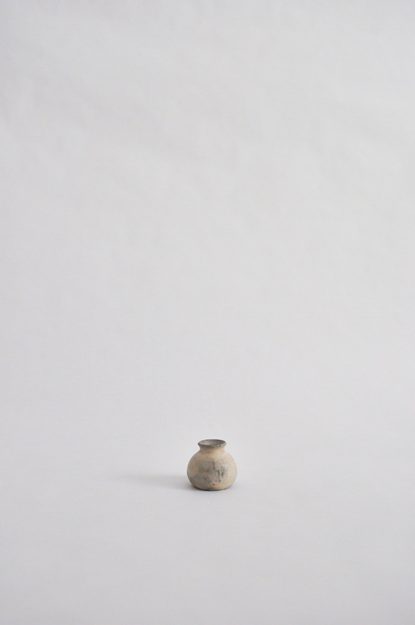 tiny wheel thrown vase, fired in a pit
