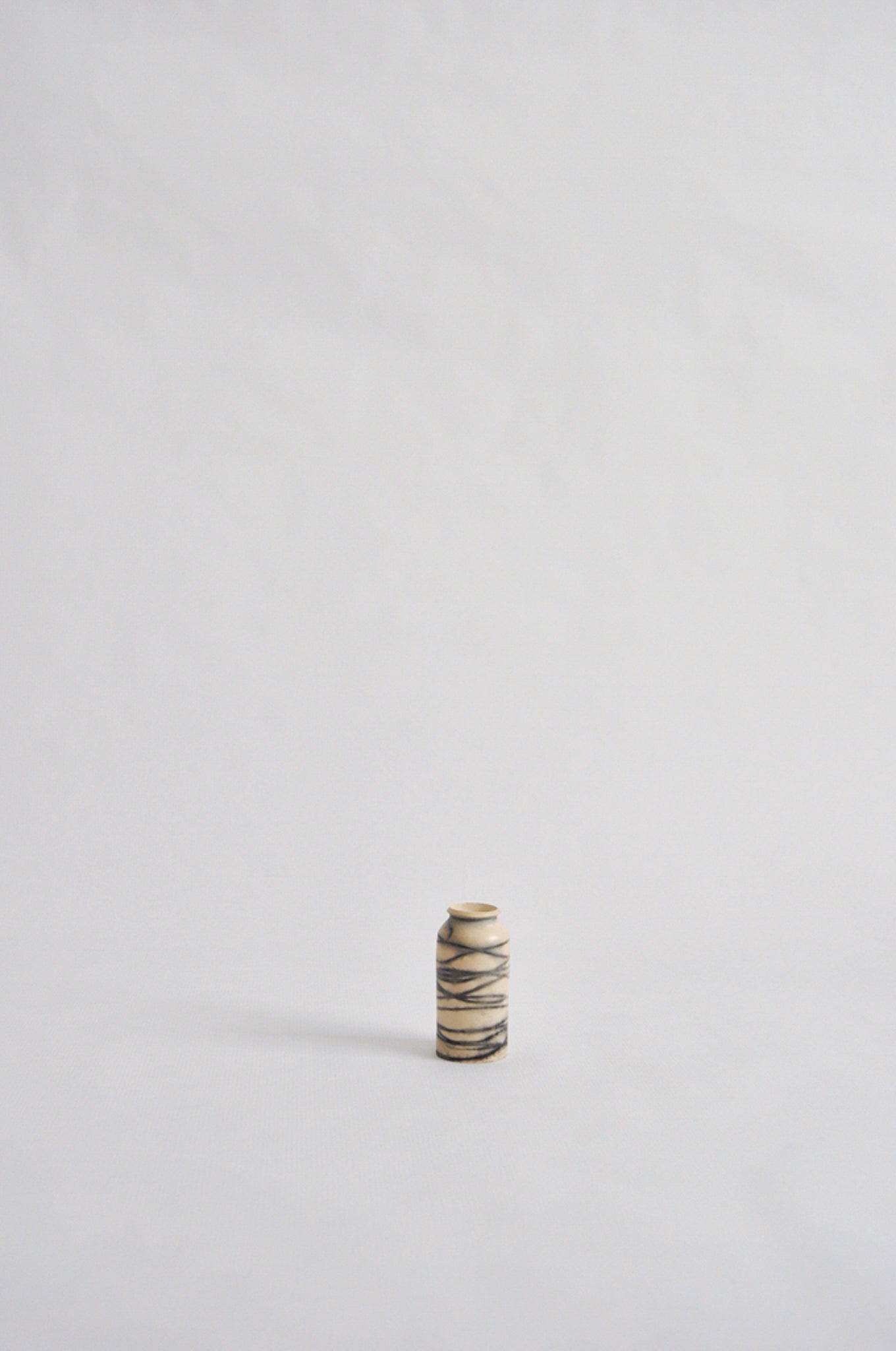 tiny wheel thrown vase, fired in a pit