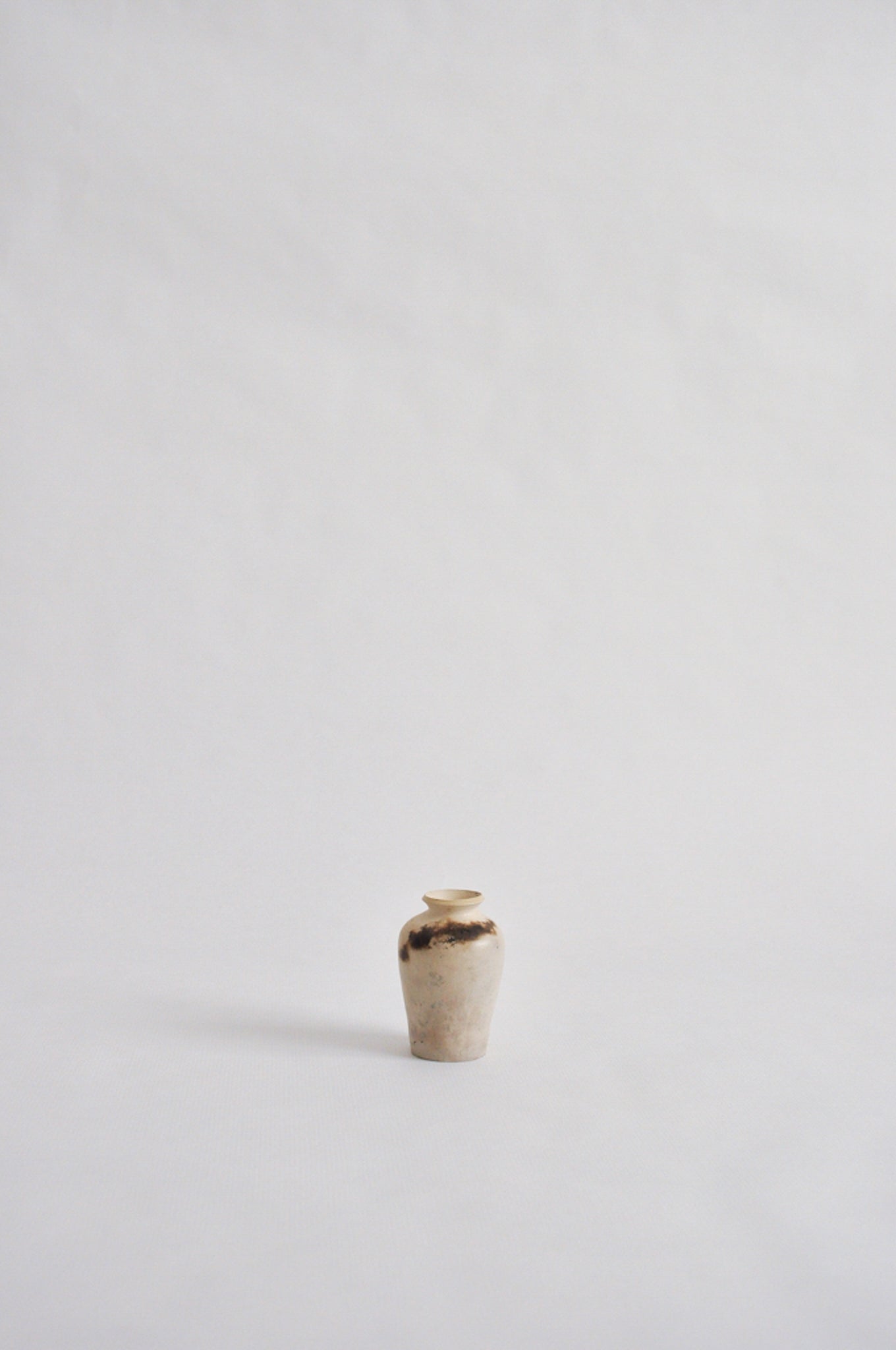 tiny wheel thrown vase, fired in a pit