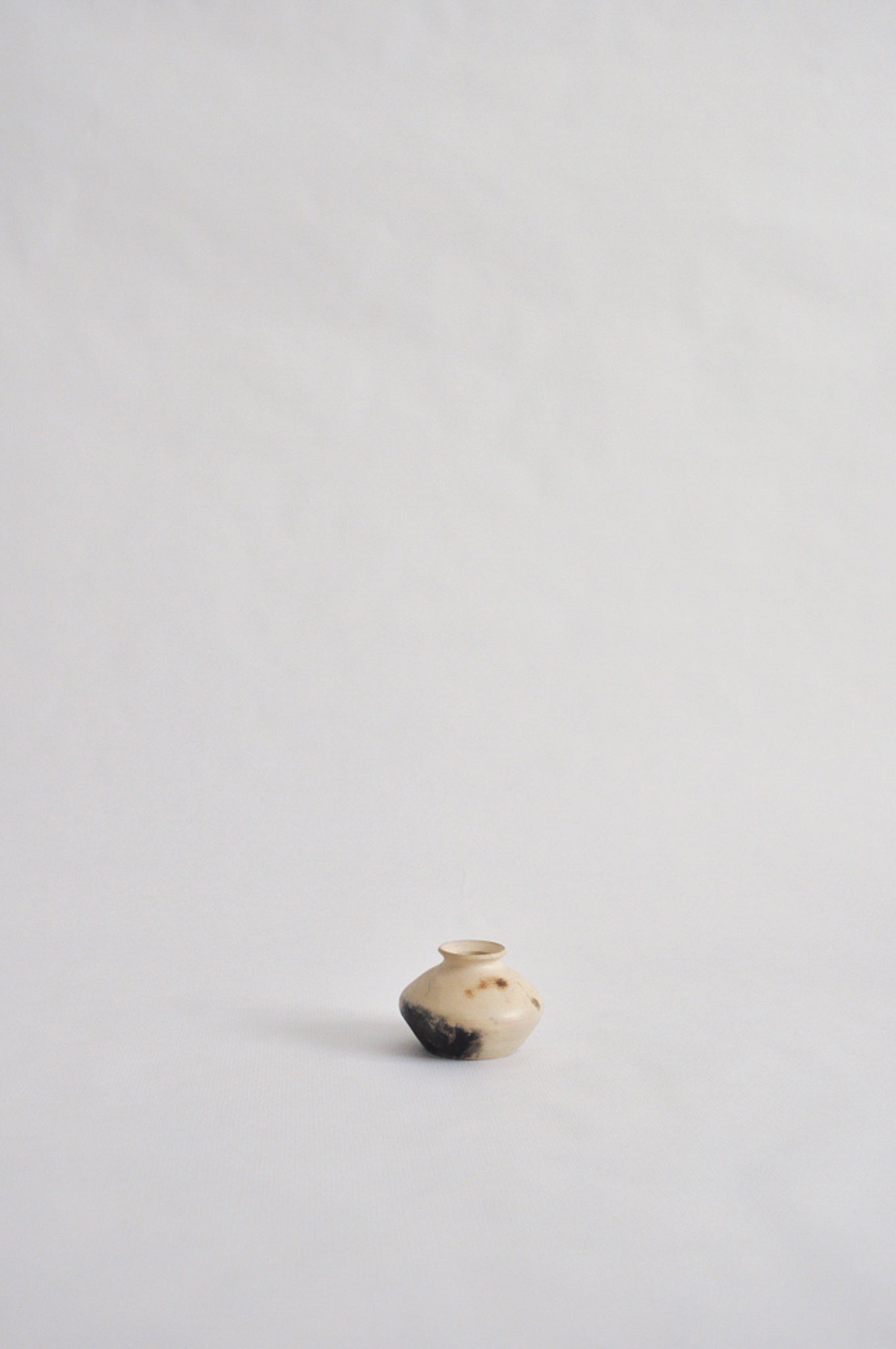 tiny wheel thrown vase, fired in a pit