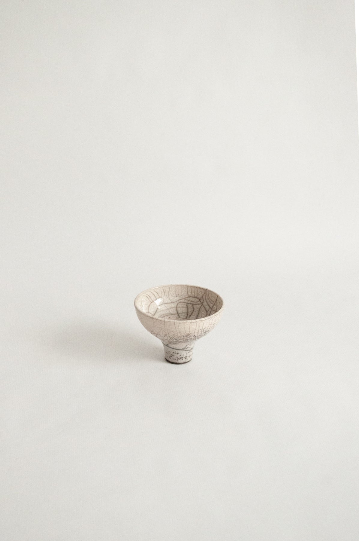 wheel-thrown, ivory craquelee, raku fired chawan