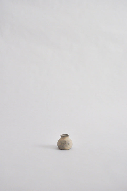 tiny wheel thrown vase, fired in a pit