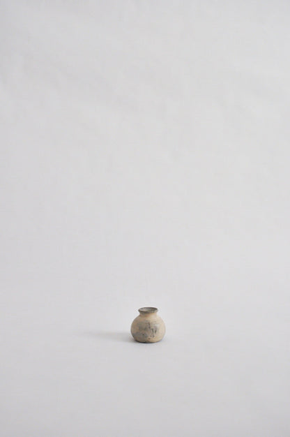 tiny wheel thrown vase, fired in a pit