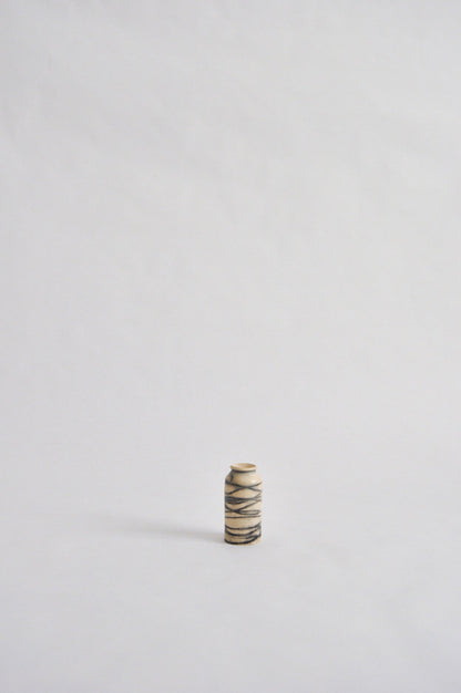 tiny wheel thrown vase, fired in a pit