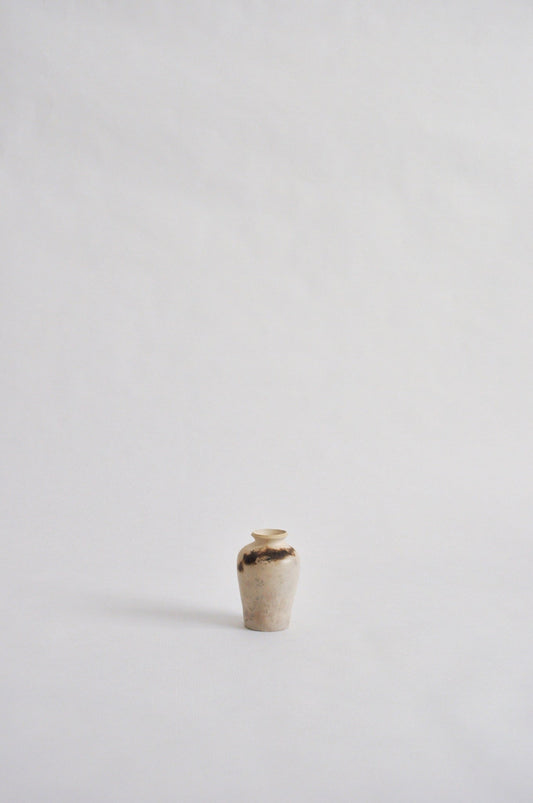 tiny wheel thrown vase, fired in a pit