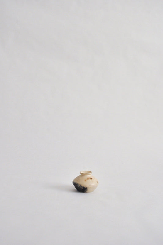 tiny wheel thrown vase, fired in a pit